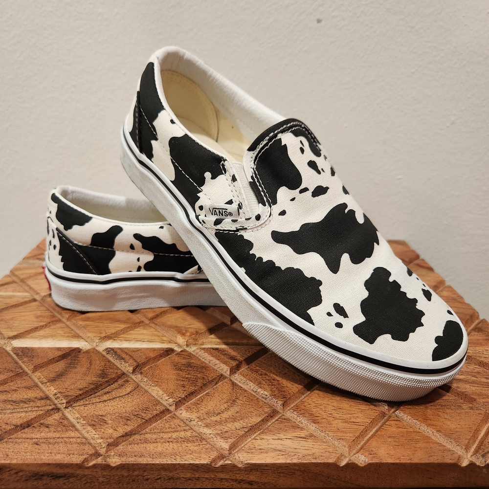 Vans Black and White Slip-On Sneakers